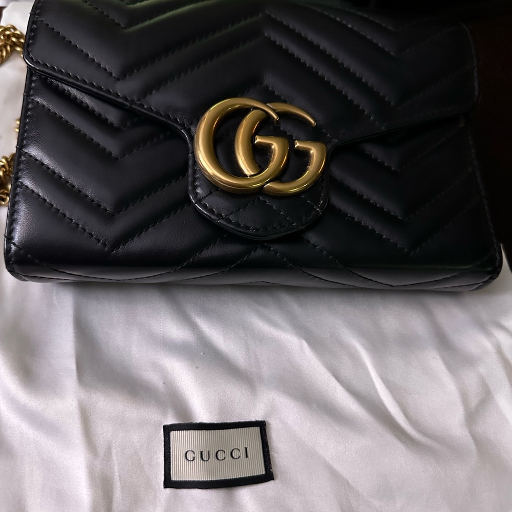 Gucci Black Quilted Crossbody Bag with Gold GG Logo-Like New